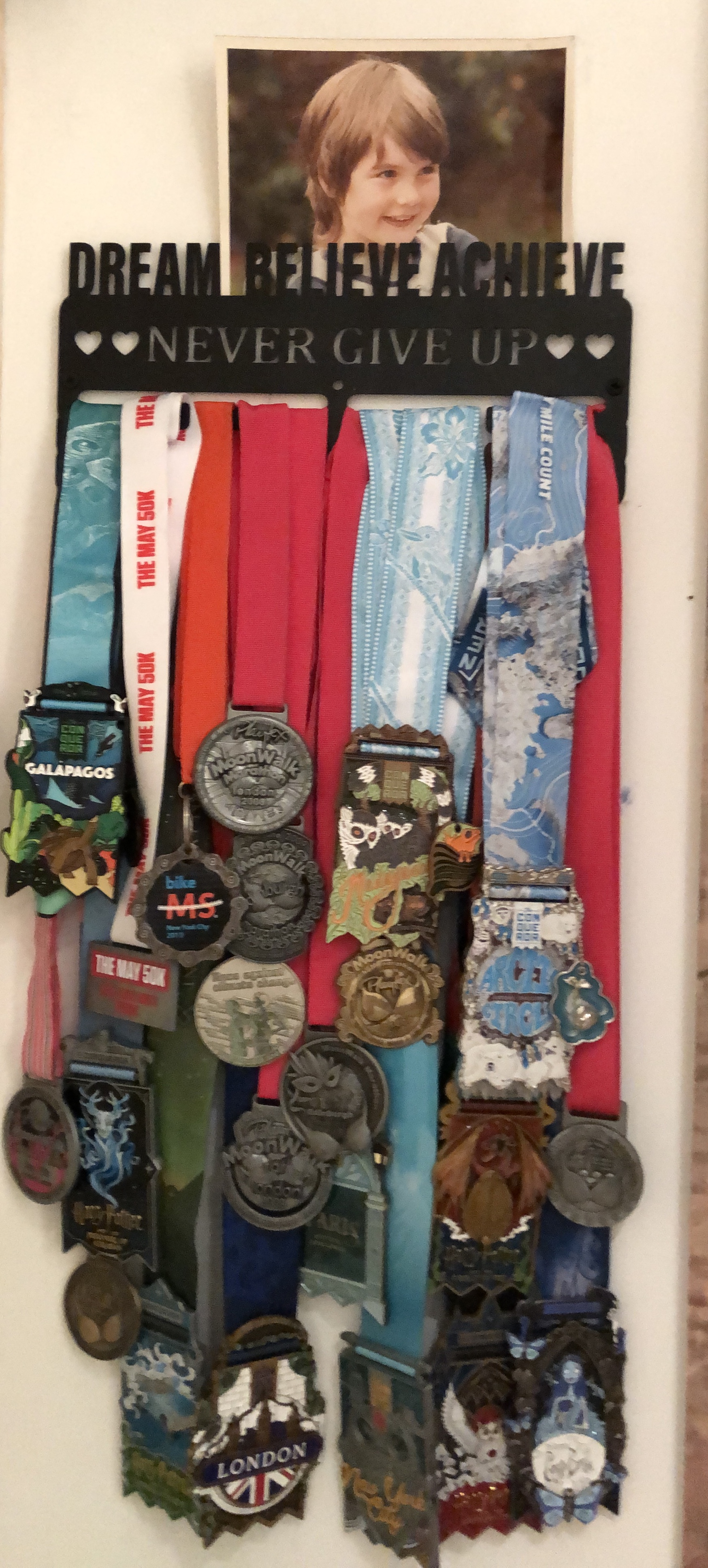 Collection of medals earned from various challenges